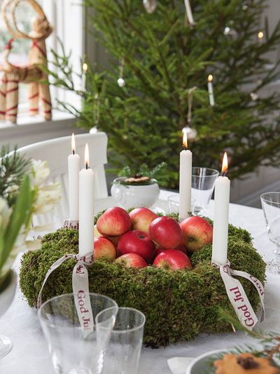 Wreath as a centerpiece ,how is it I never thought of that ?! I even have battery operated ones with preset lights & timer Such a great idea ...could build up the inside so its higher , unless ideas wow !