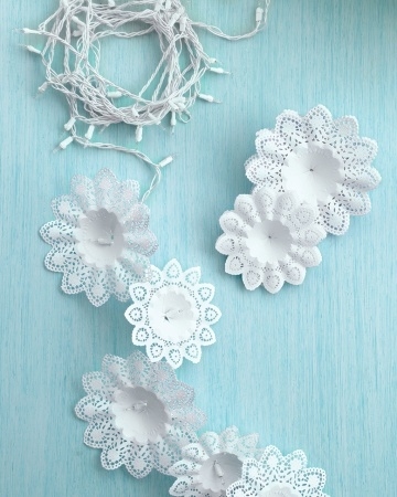 Make snowflake lights with store-bought bouquet holders.