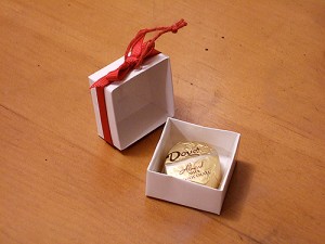 place chocolate in each box