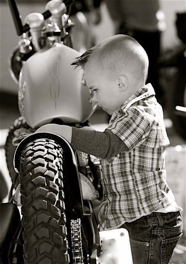 This is what my boy will look like!!! Working on bikes with his pop!! With a sweet haircut!!