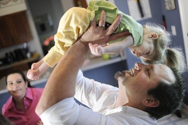 John Williams plays with his daughter