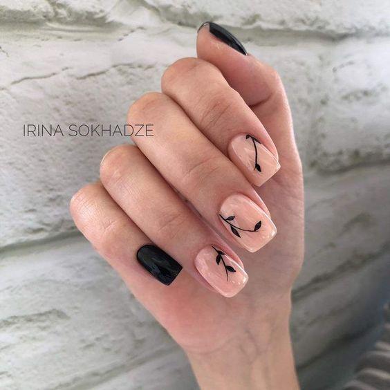 μαύρο μανικιούρ με ροζ και σχέδια