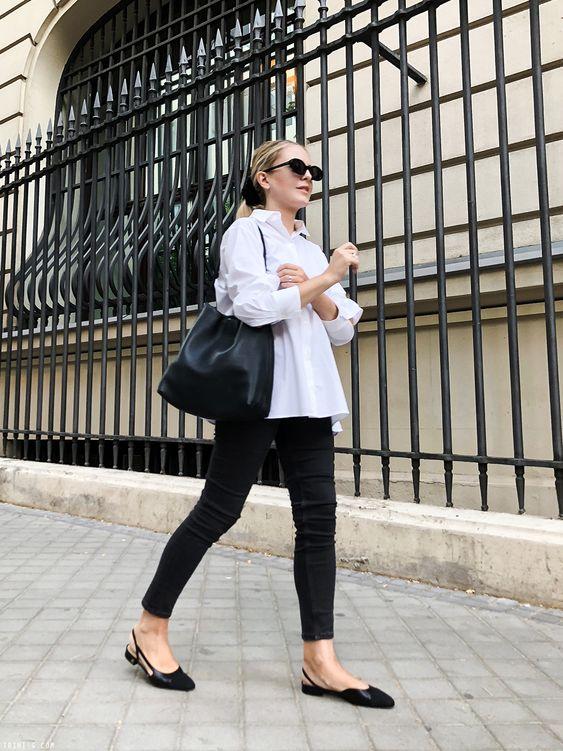 Black & white outfits: λευκό πουκάμισο, μαύρο παντελόνι και μαύρη τσάντα Black & white outfits: λευκό πουκάμισο, μαύρο παντελόνι και μαύρη τσάντα