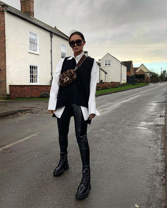 Μάλλινο γιλεκο_με λευκό_πουκάμισο_και_δερμάτινο κολάν_