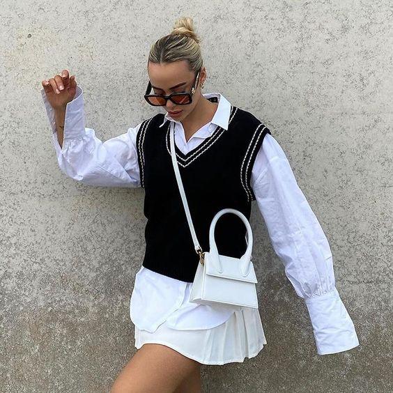 sweater_vest_με_μαύρο_μαλλινο γιλεκο_και_λευκό_πουκάμισο_