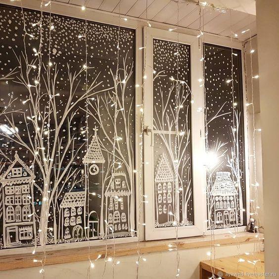 χριστουγεννιάτικα φώτα led-στο-παράθυρο-με-ζωγραφισμένα-χριστουγεννιάτικα-σχέδια-