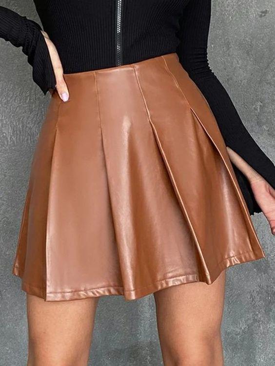 καφέ-δερμάτινη μίνι-φούστα-με-πιέτες-τάσεις Χειμώνα 2022- καφέ-δερμάτινη μίνι-φούστα-με-πιέτες-τάσεις Χειμώνα 2022-