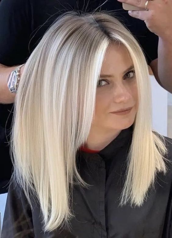 ίσια-μαλλιά-με-τουφάκια-ιδέες-για-κουρέματα-για-γυναίκες-άνω των 40-