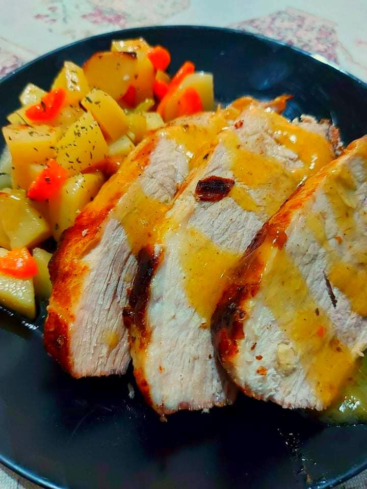 χοιρινό μπούτι-με-μέλι-και-πορτοκάλι-συνταγή-