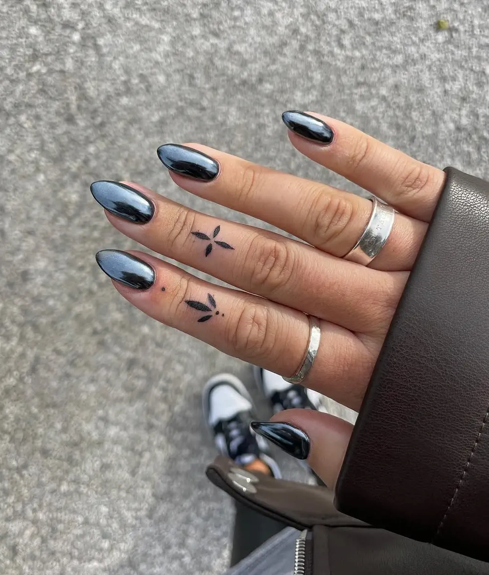 almond black nail ideas with metallic finish webp