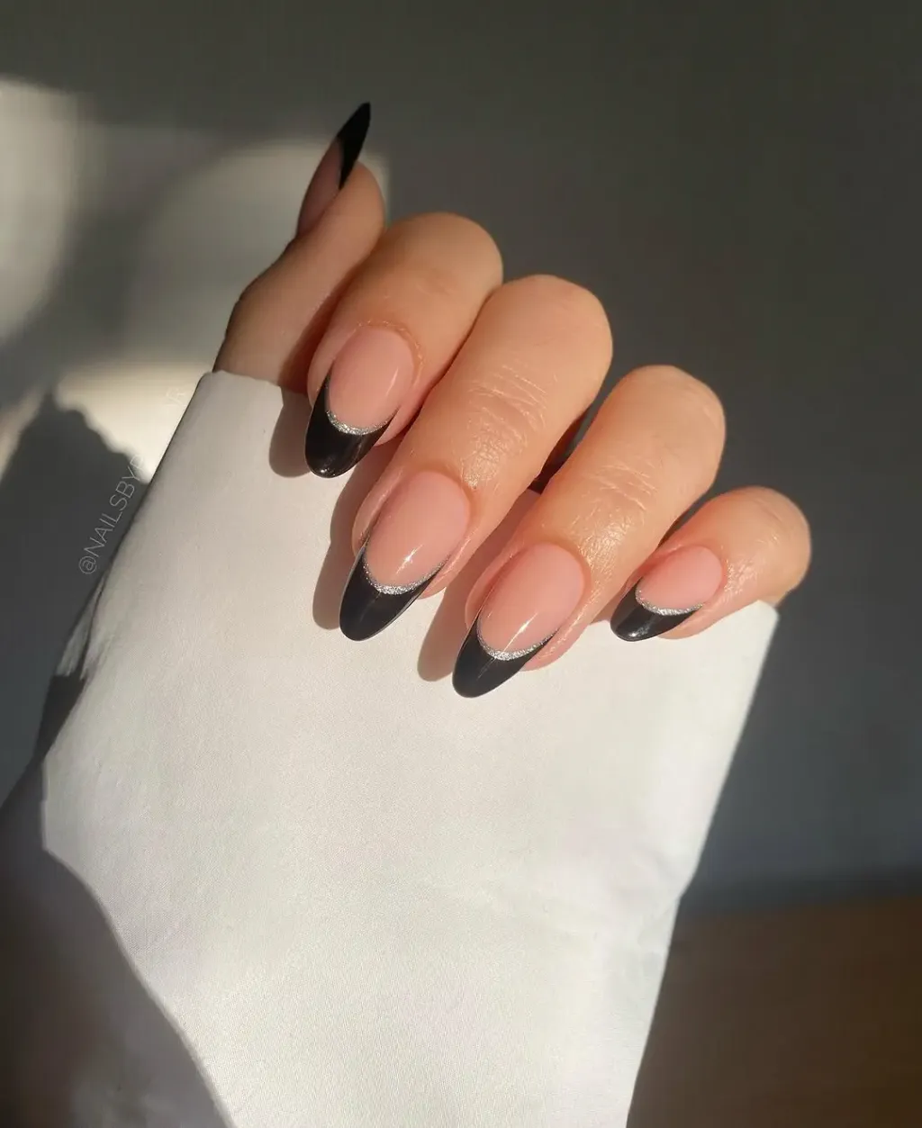 cute almond black nails with sparkly silver designs webp